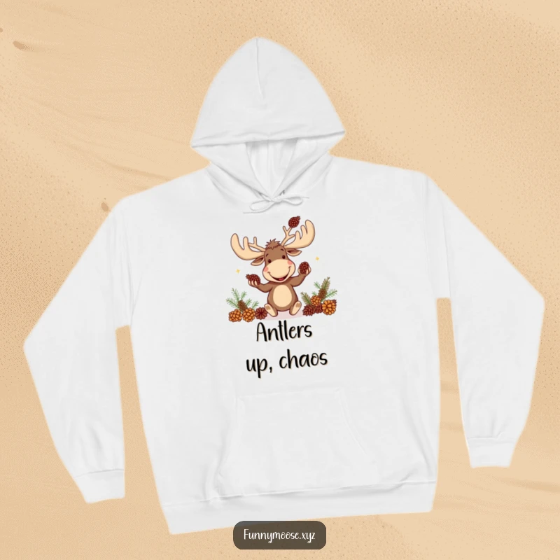 Funny hoodie art of a silly moose with enormous antlers engaged in the act of juggling pinecones.