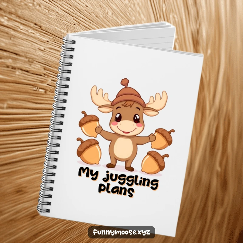 Funny Moose Notebook with a hat attempting to juggle acorns, perfect for notes and whimsical journaling.